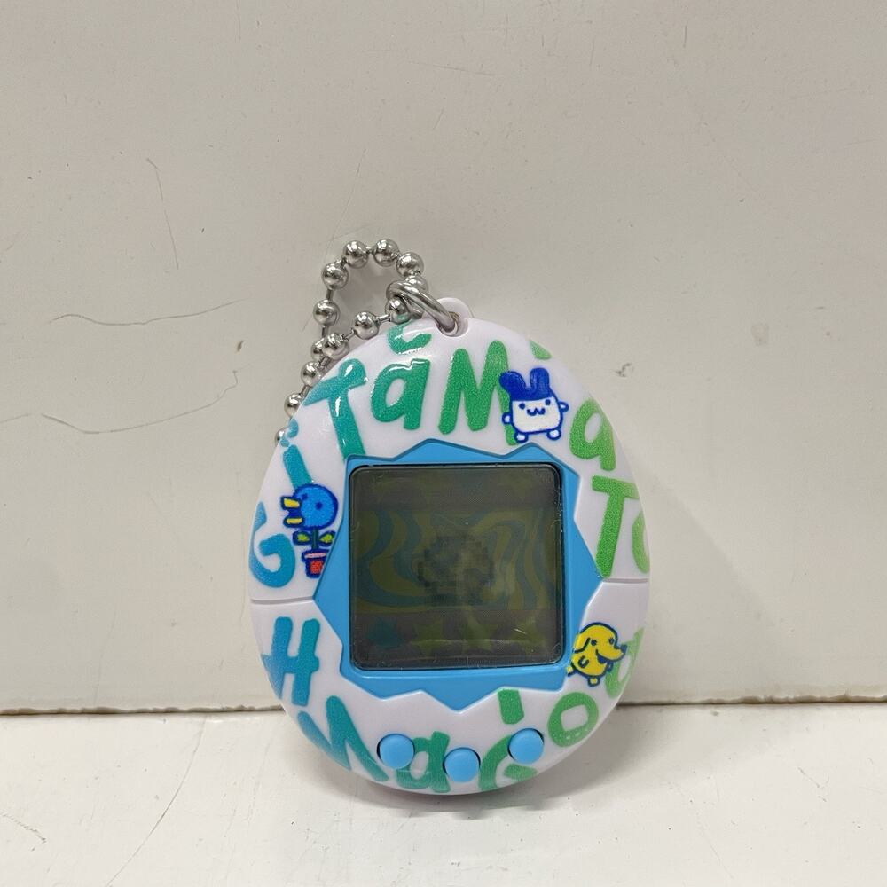 2017 Tamagotchi 20th Anniversary Celebration Edition Repeating Logo Tested Works